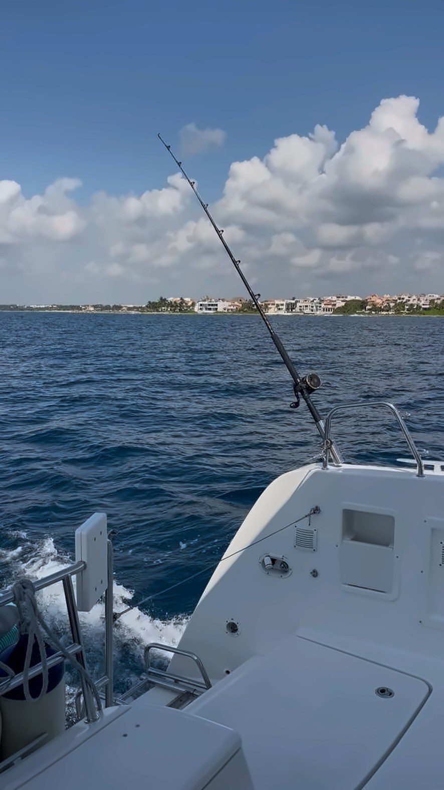 Fishing rod trolling from the 40 ft Lagoon Blue Iris catamaran