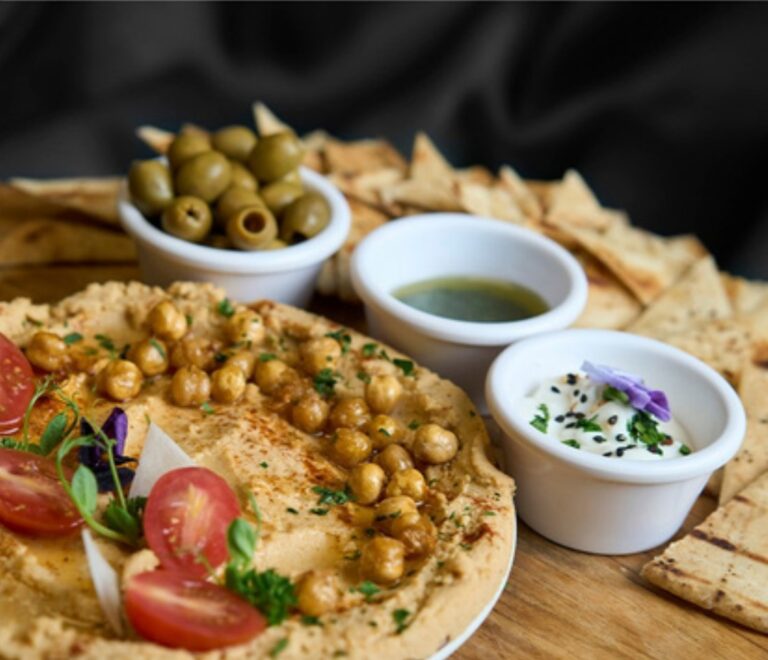 Hummus with pita and olives