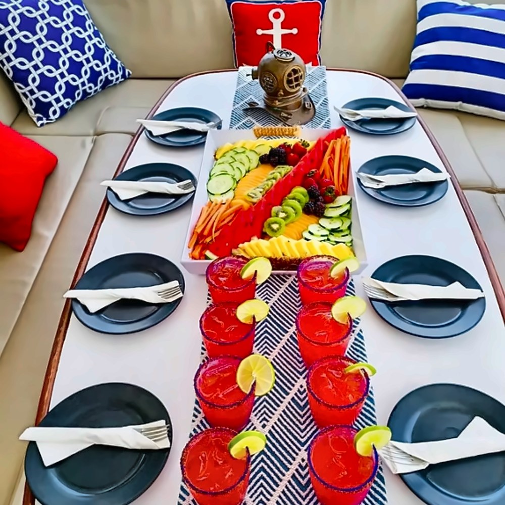 Fresh fruit platter and cocktails served on a private catamaran