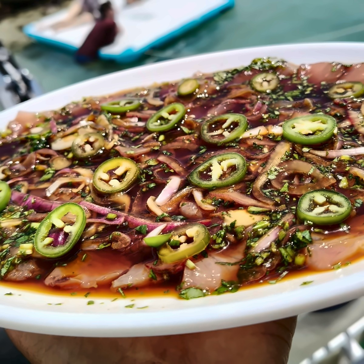 Fresh fish caught and sliced on board