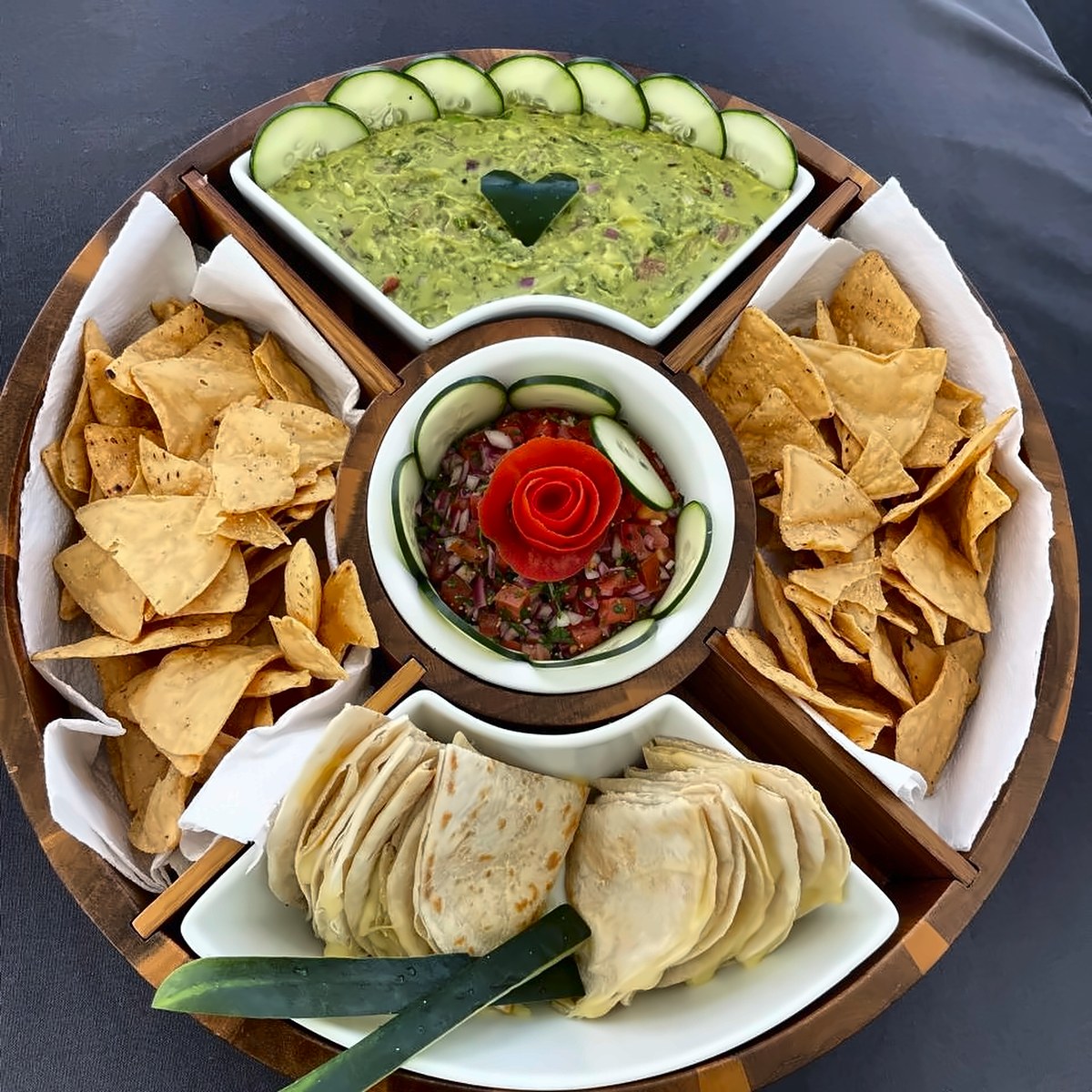 Guacamole, pico de gallo, chips and quesadillas on a private yacht
