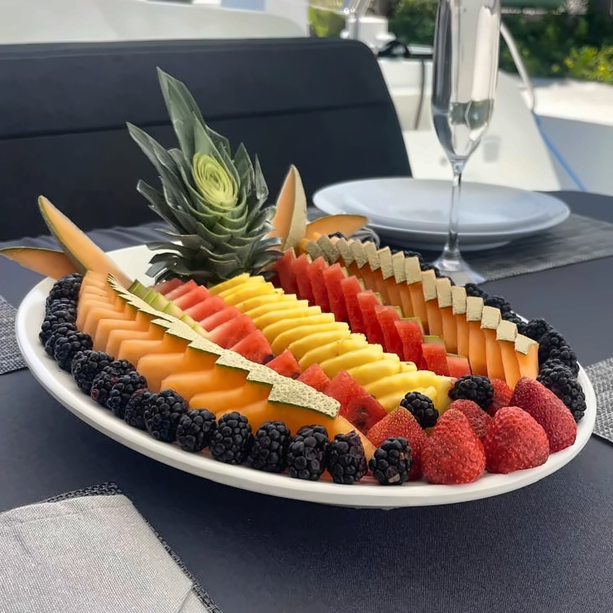 Tropical fruit platter on a private yacht charter